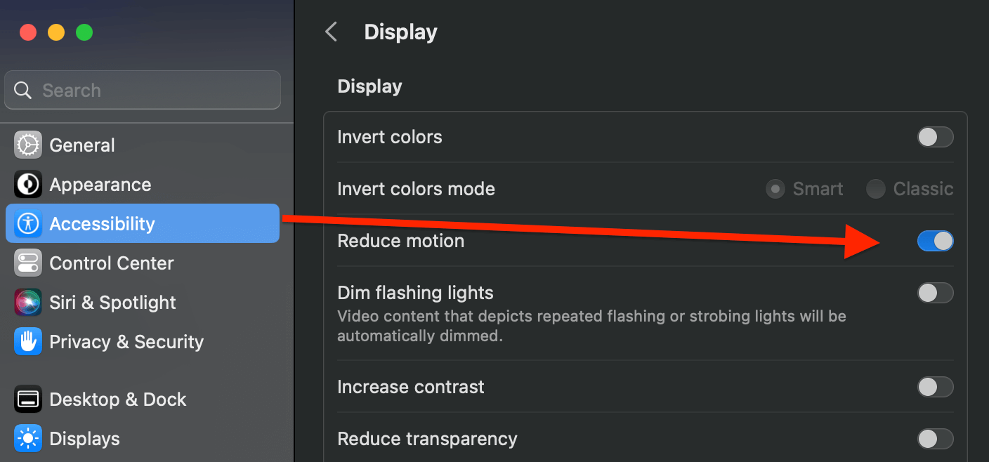 Screenshot of the MacOS Preferences pane eith accesibility options open and an arrow pointing to the reduce motion option