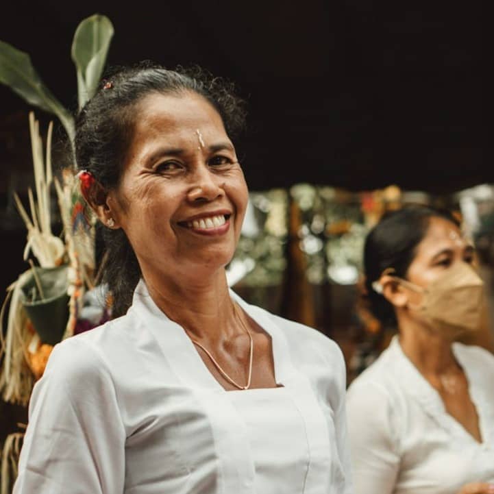 a person holding a plate of food