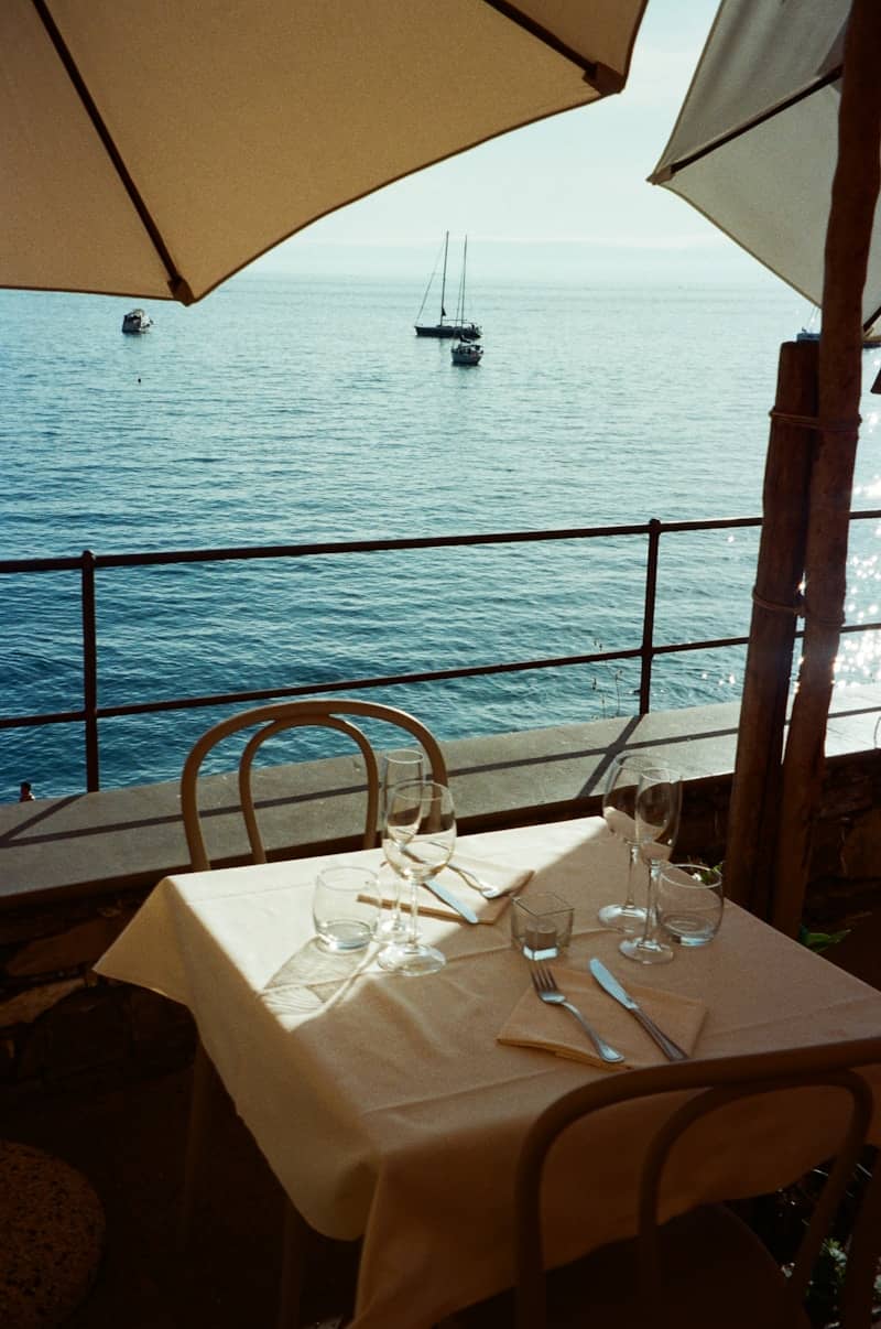 Restaurant table with a view of the ocean.