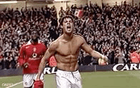 Football Player walking showing core muscles
