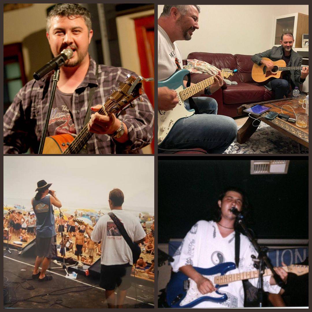 Mike singing with guitar