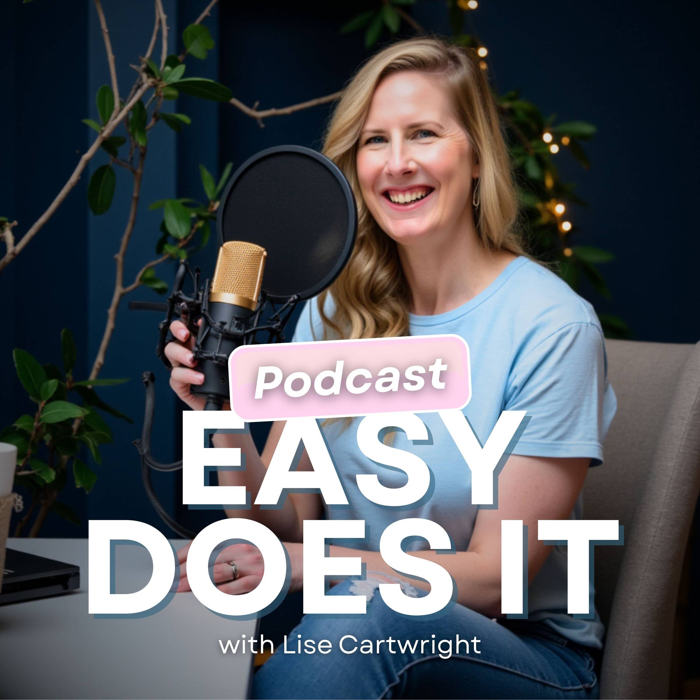 Woman sitting at desk with podcast microphone