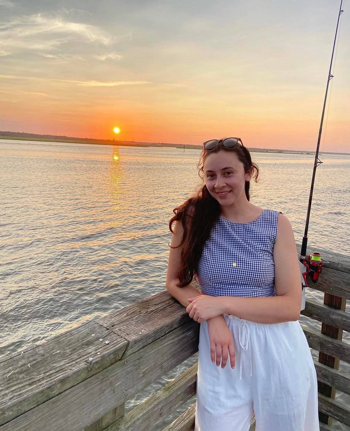 Jessica Cervantes, MSN, RN, smiling at the beach.