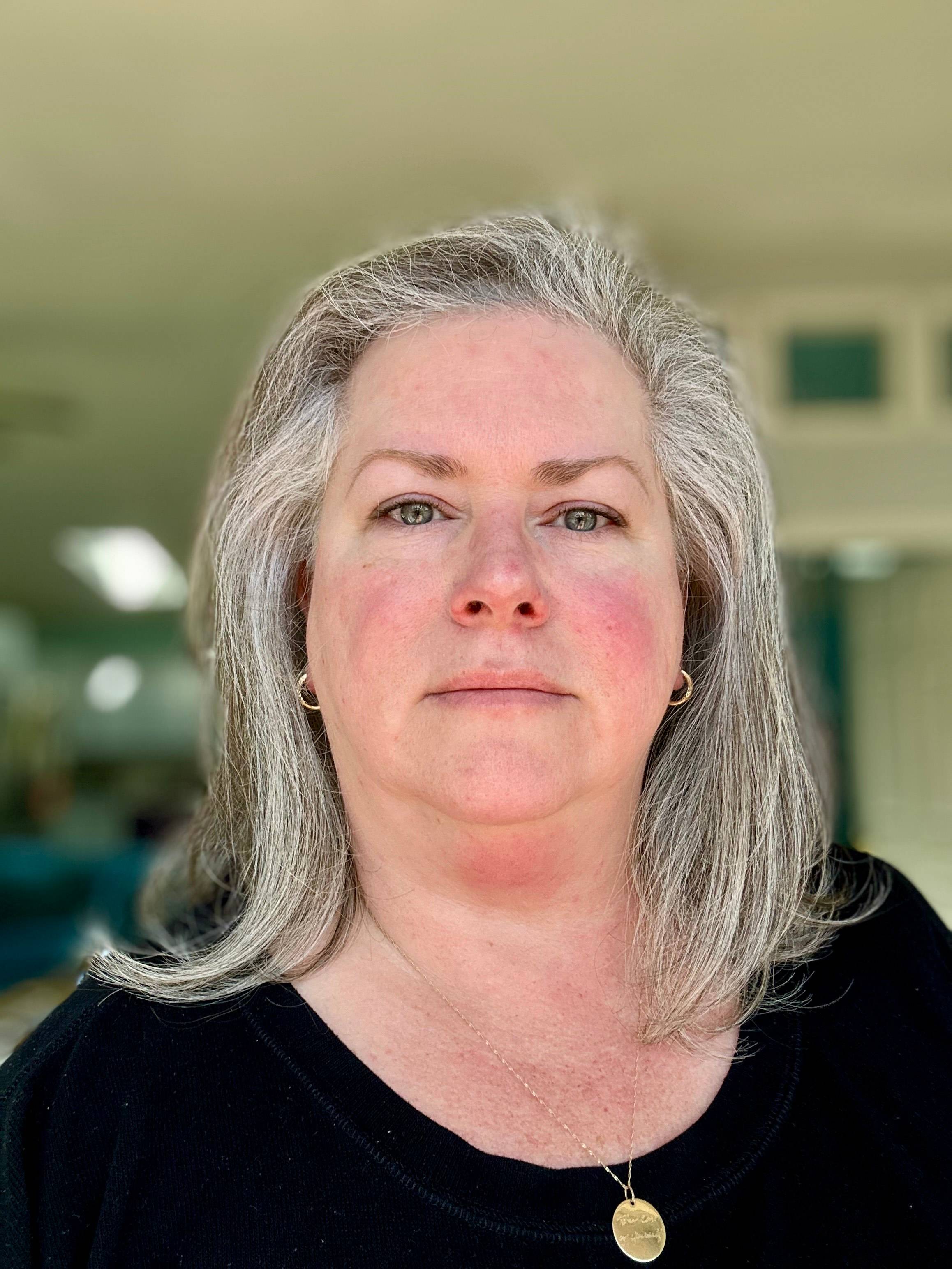 Leanna Coy, FNP-BC, looks into the camera.