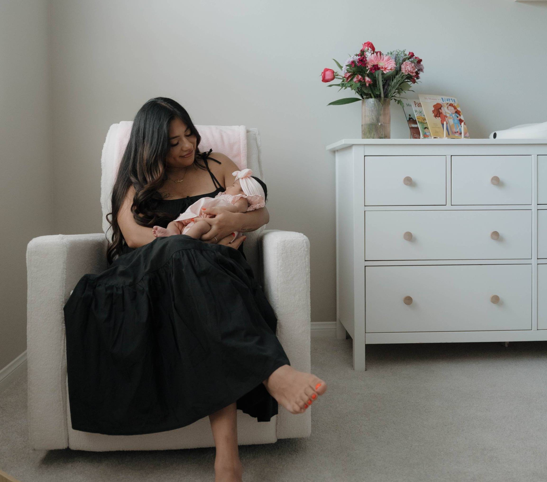 New mom and nurse Angie Ruiz-Calayag is pictured with her baby.