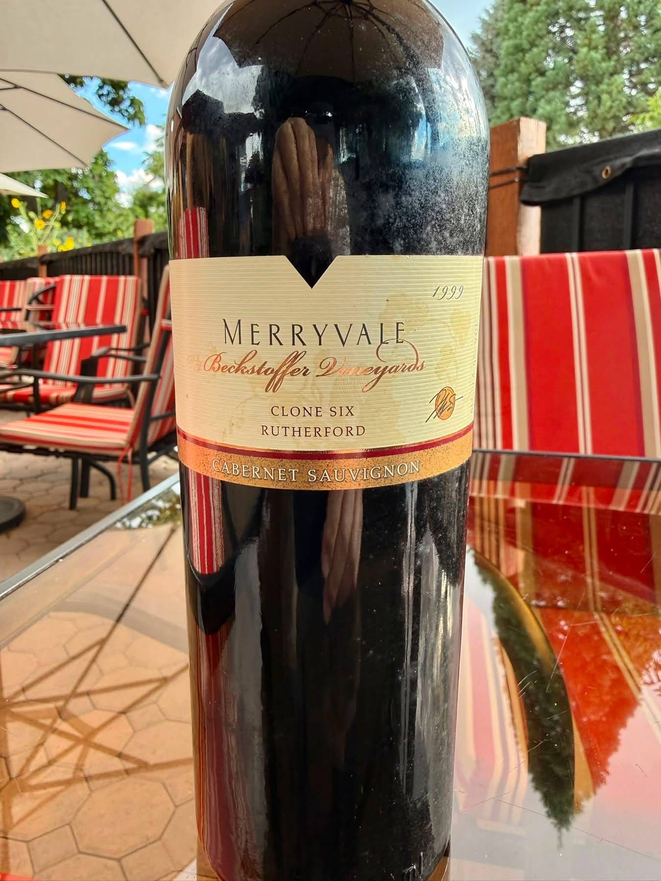A 1999 Merryvale Beckstoffer Clone Six Cabernet from Rutherford, standing on a patio table in Reno.