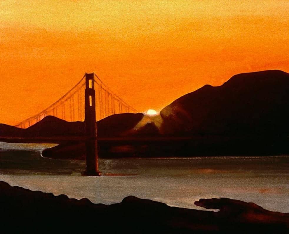 Golden Gate Bridge. The sun going down behind the Marin Headlands.