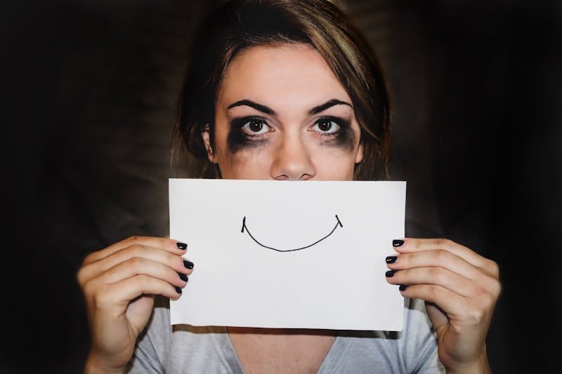 person woman emotions paper smile