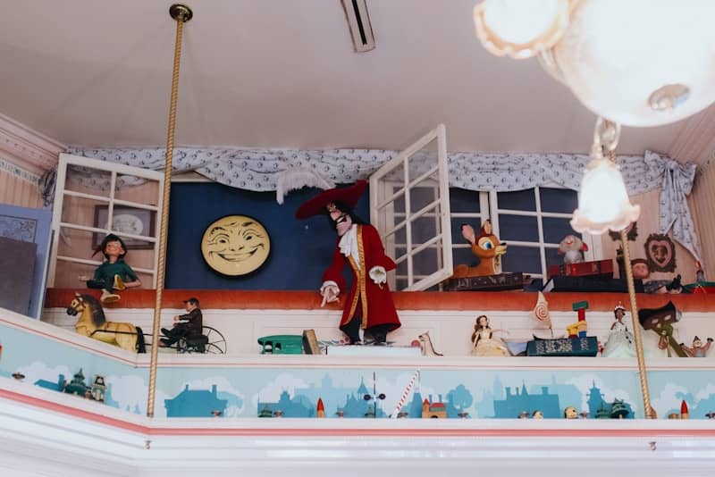 Captain hook and peter pan figures on a whimsical display.