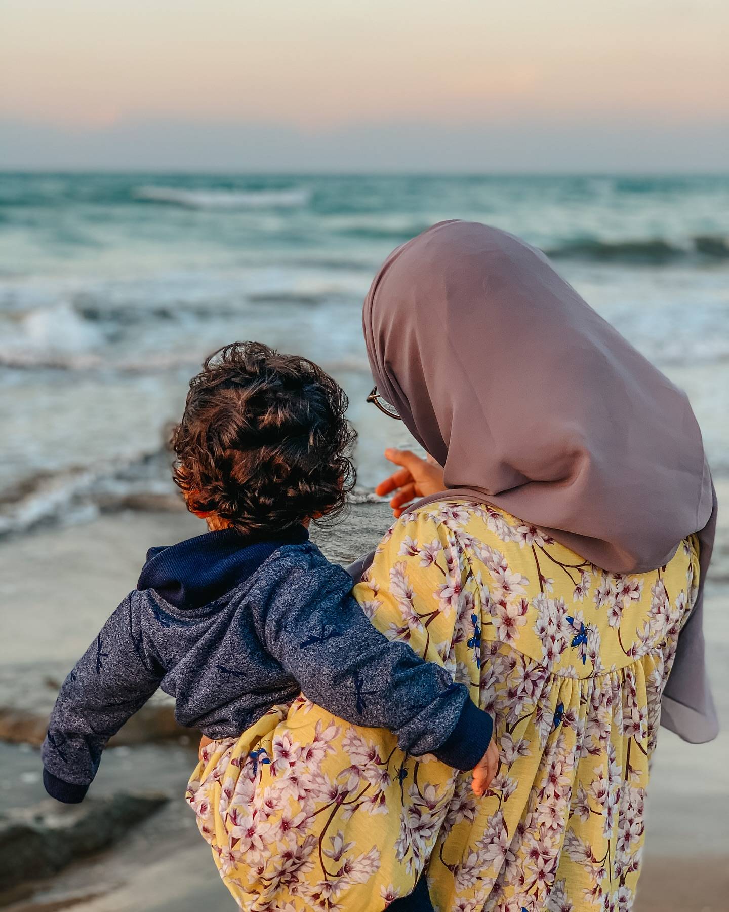 woman carrying baby