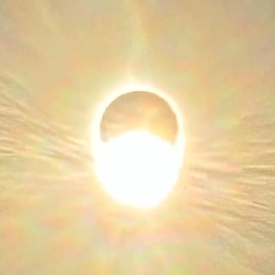 The sun peeks out from behind the moon at the end of the April 8, 2024 total solar eclipse.