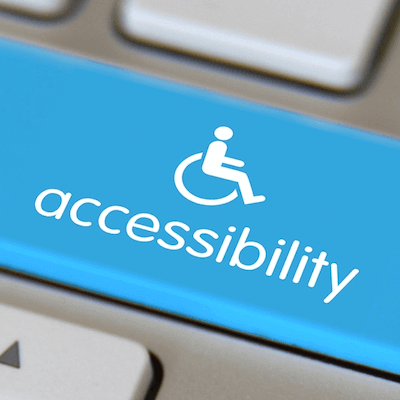 Close-up of keyboard with a blue key labeled "Accessibility"