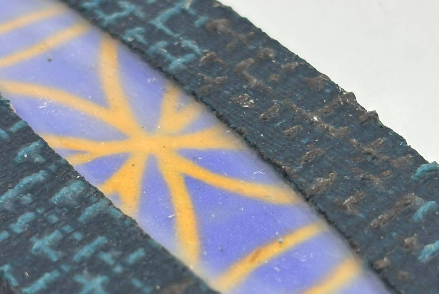 Beautiful panel — the texture of the reclaimed material on the border against the smooth encaustic interior is striking. Alt text (blog/accessibility): "Close-up of a leaf-shaped Weave of Life encaustic panel by Nancy Fritz, featuring a periwinkle blue wa