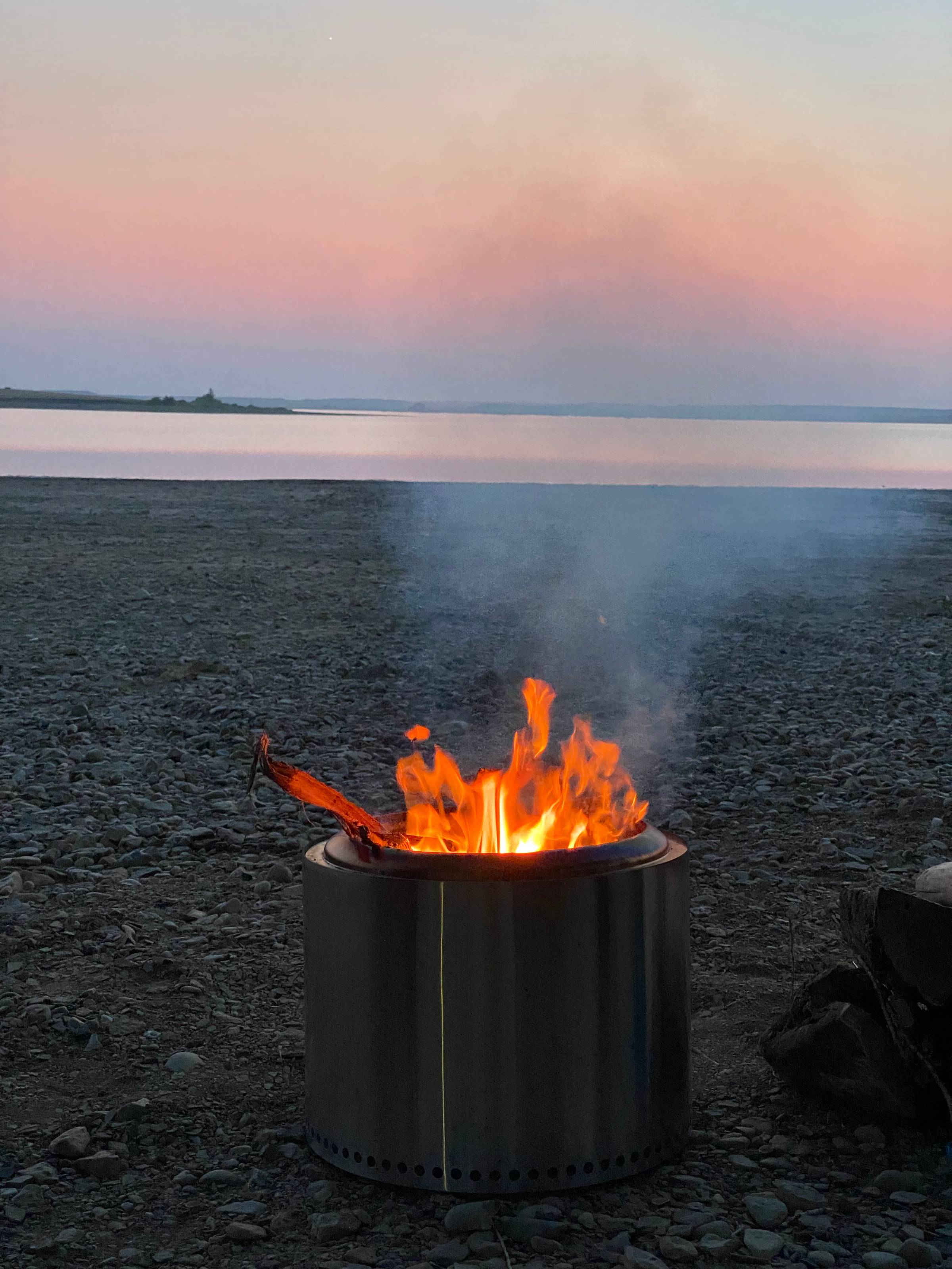 Campfire by water