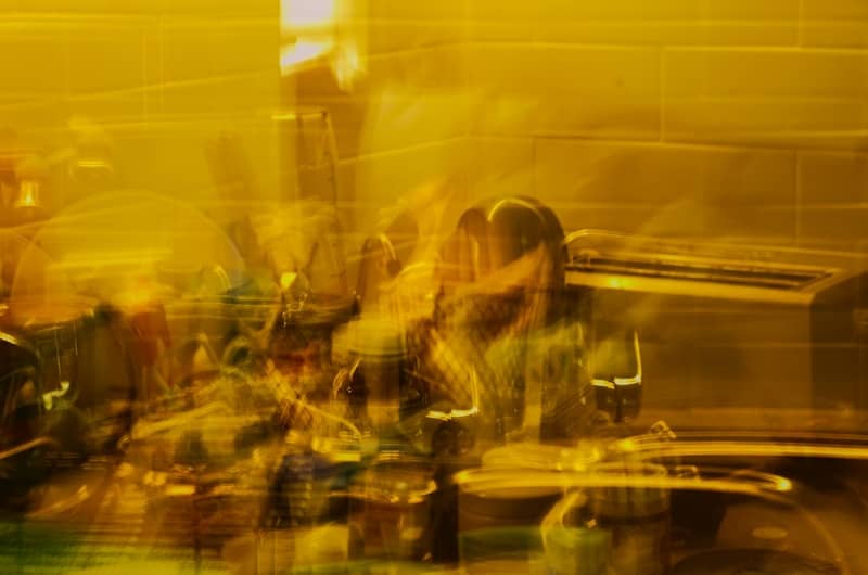 A blurry photo of a group of people sitting at a table