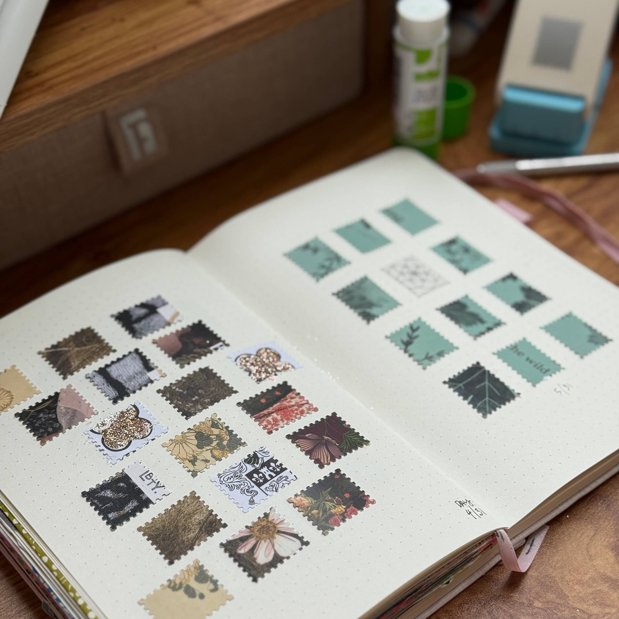 A notebook with tiny stamps pasted into it.
