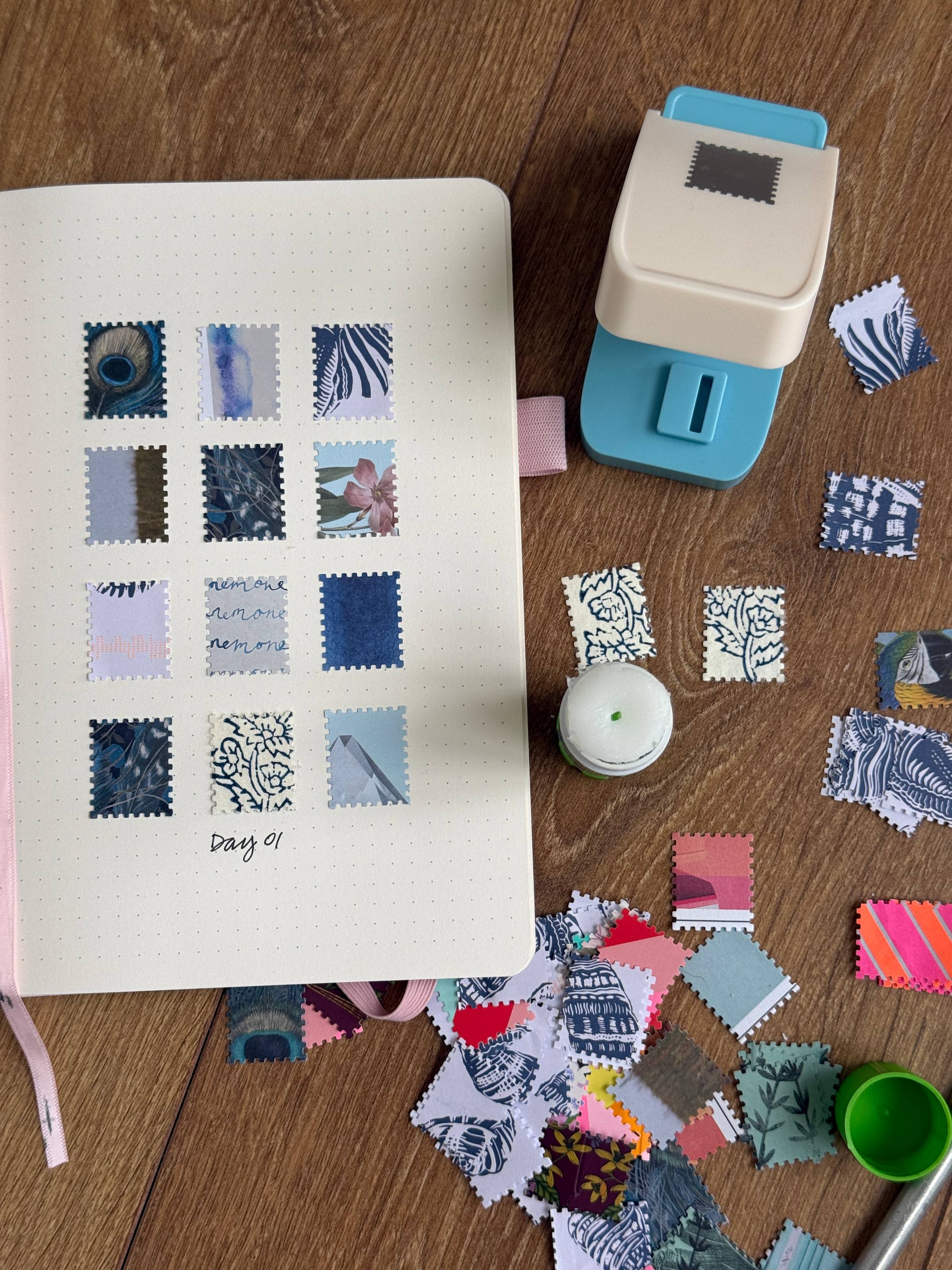 collage in a sketchbook on a table with lots of tiny images scattered around