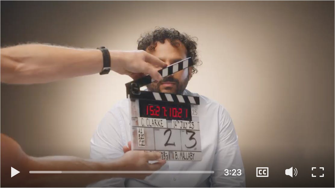 A screenshot of comedian Nish Kumar setting up for a video for Climate Science Breakthrough