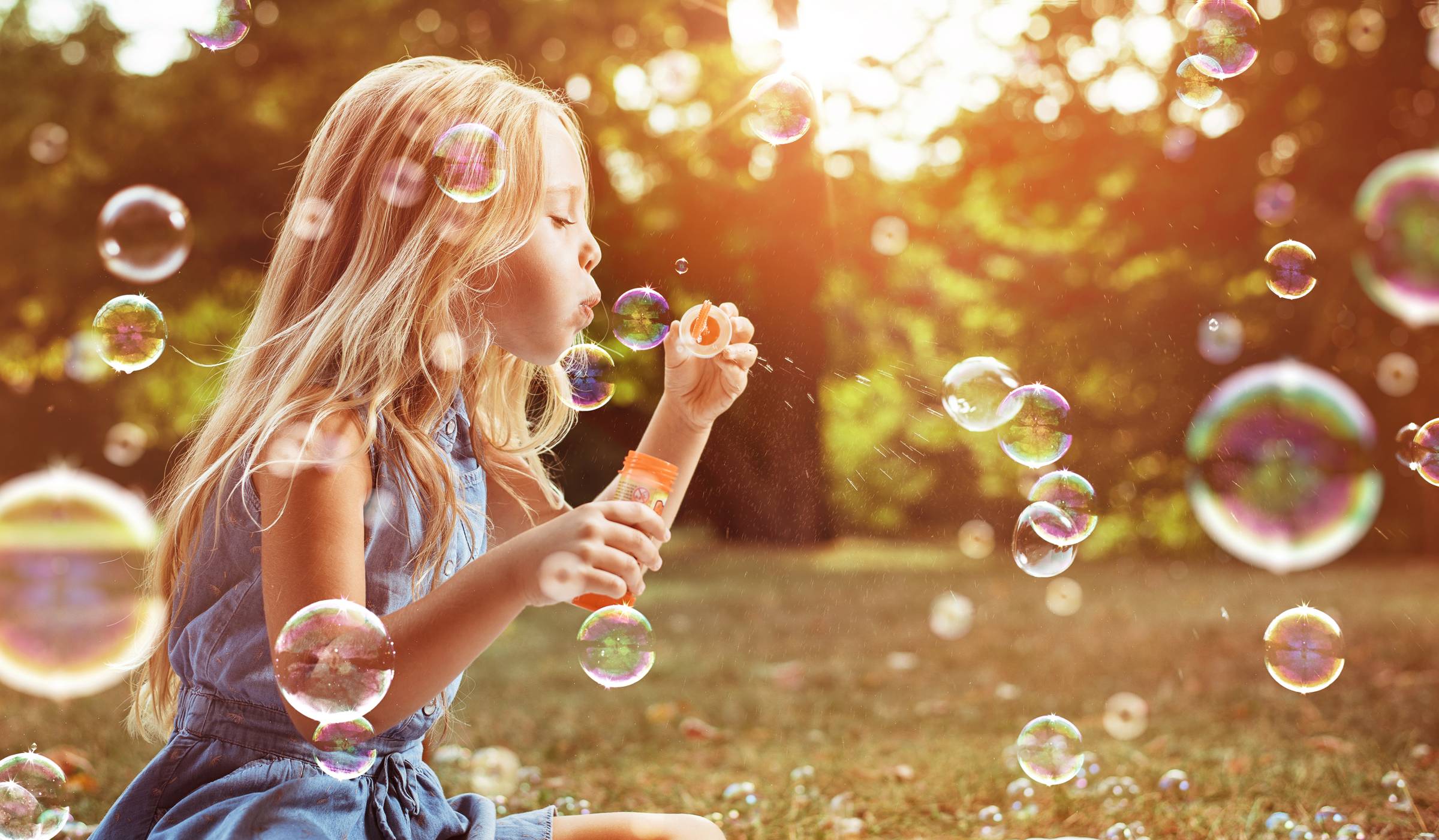 Summer holiday bubble making in the sunshine