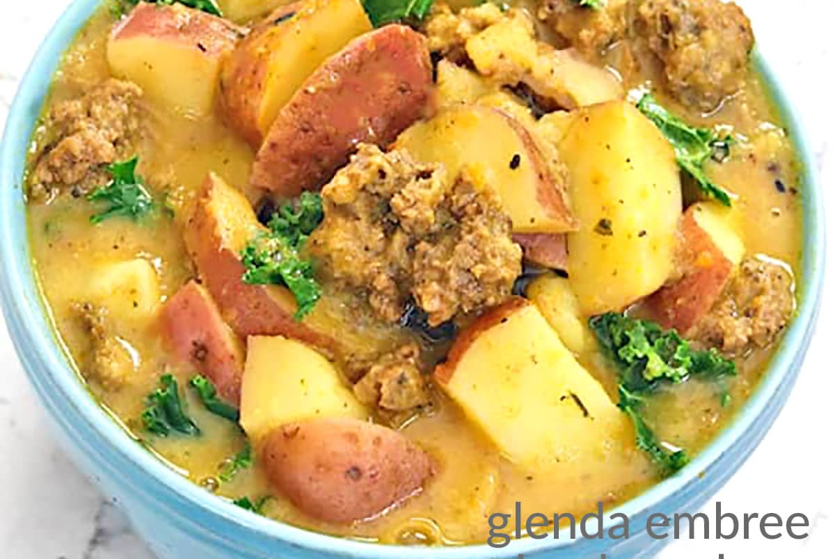 Whole30 compliant Zuppa Toscana in a blue stoneware bowl.
