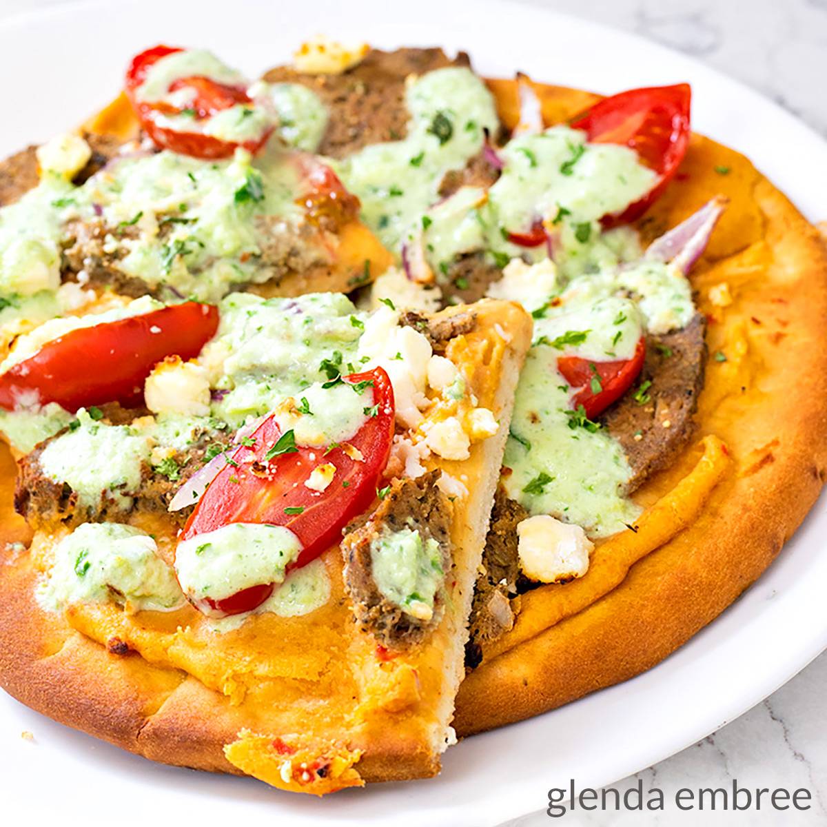 Air Fryer Gyro Pizza on a white plate.