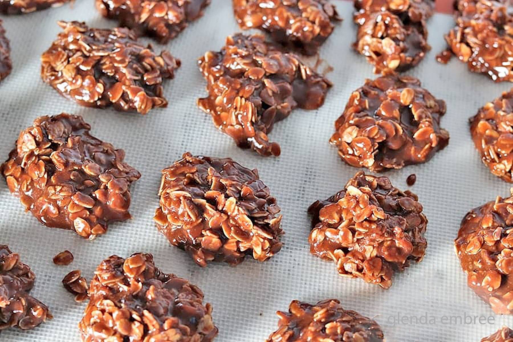 Easy Chocolate No Bake Cookies cooling on a Silpat.