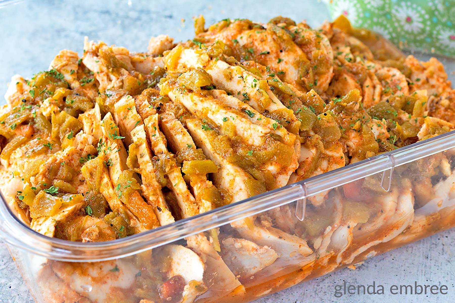 Slow Cooker Southwest Chicken cooled, sliced and ready to store.