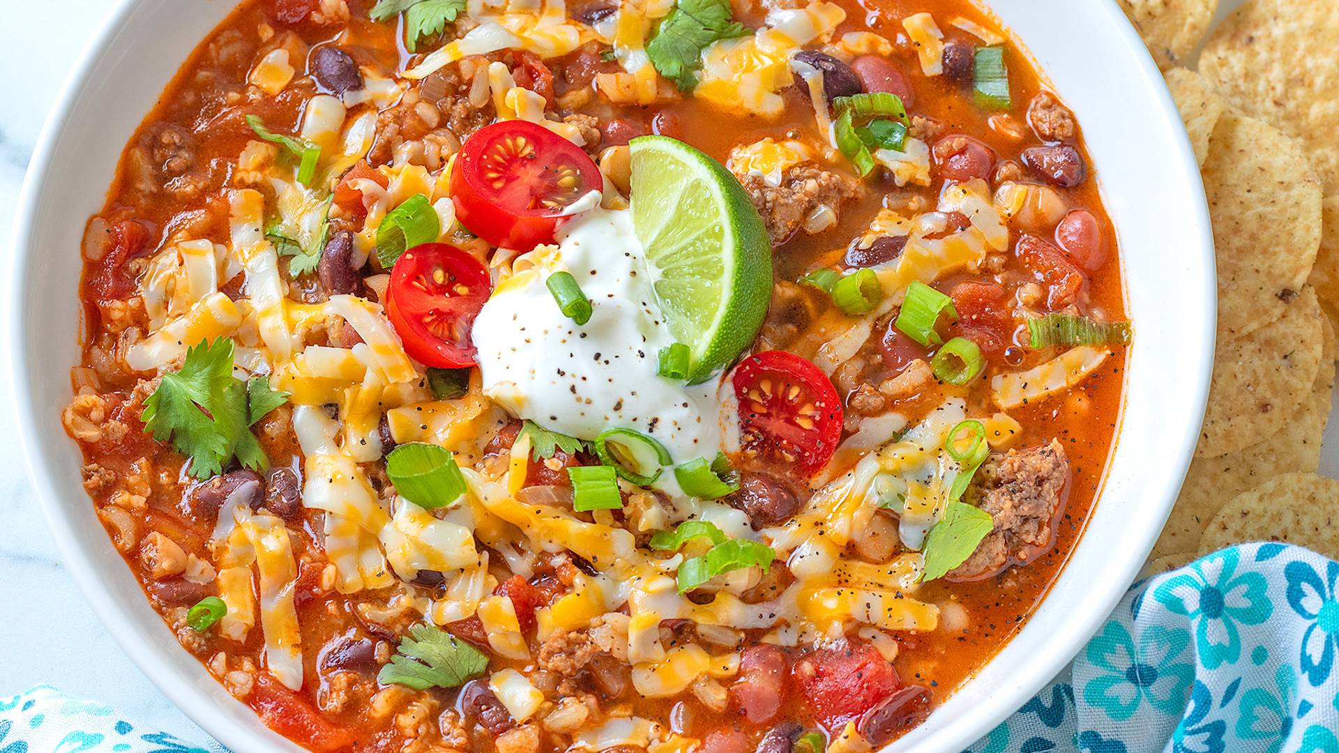 Easy taco soup in a white ceramic bowl.