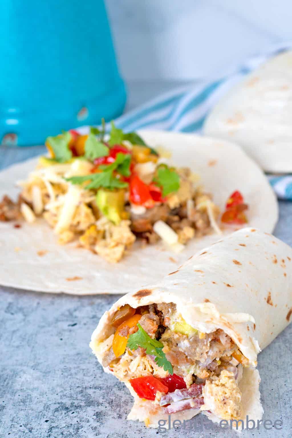 Breakfast tacos on a concrete countertop.
