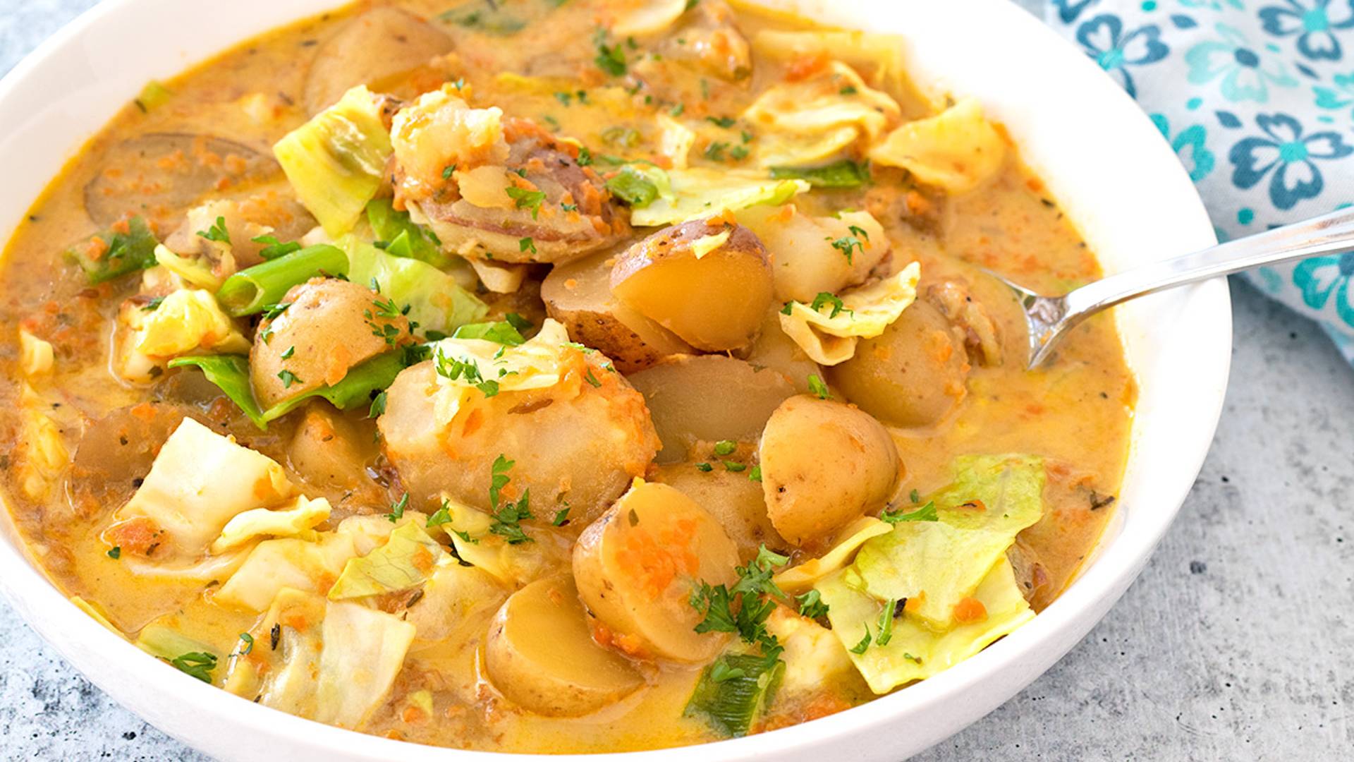 Colcannon Soup in a white bowl.