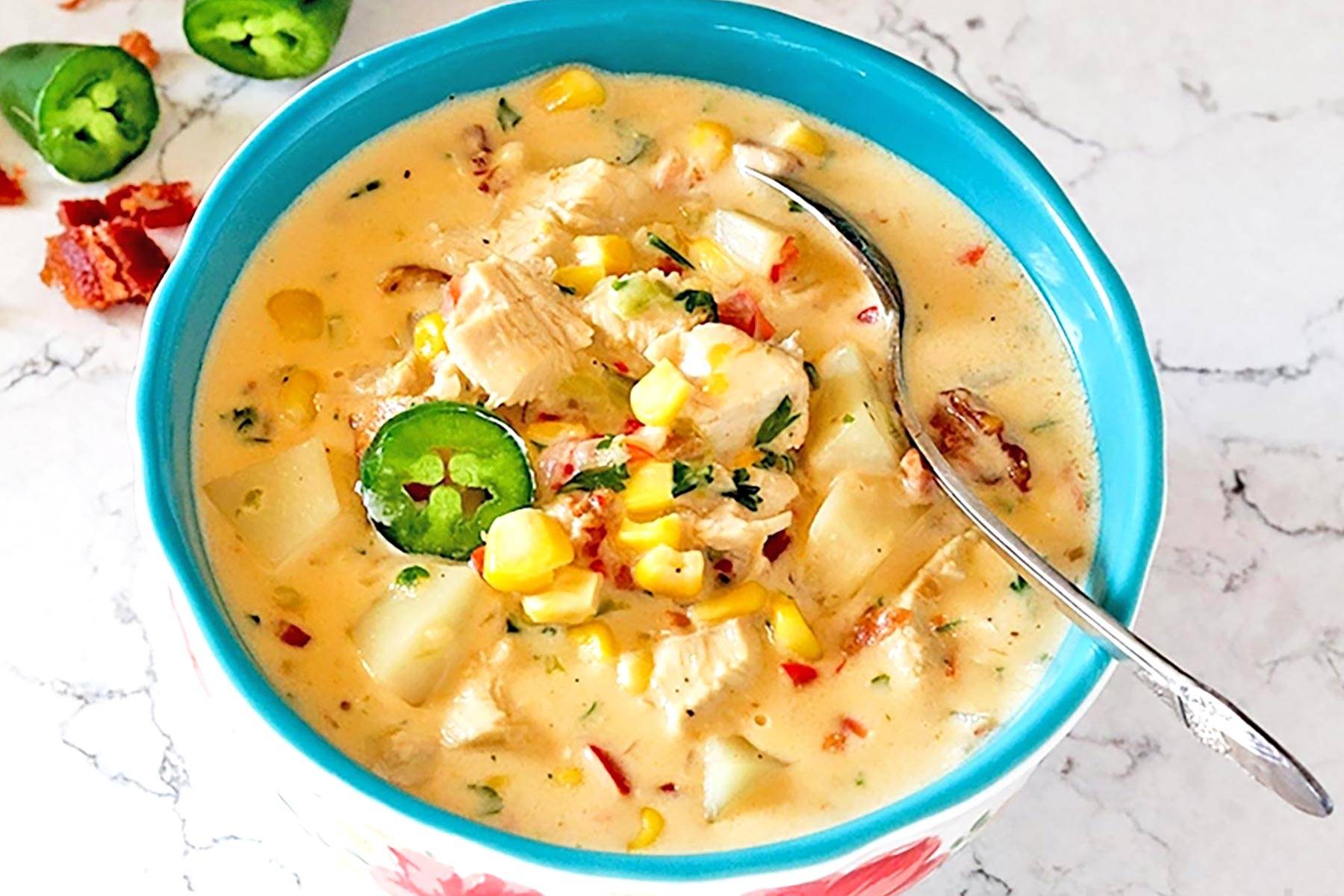 Jalapeno Chicken and Corn Chowder in a turquoise bowl.