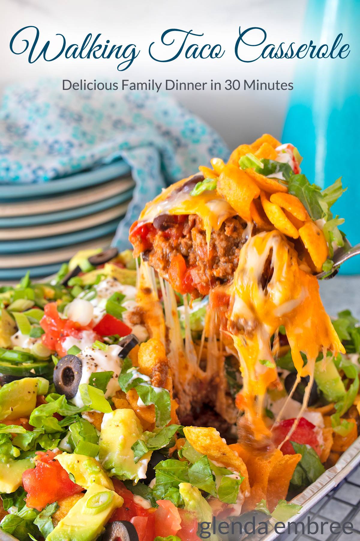 Walking Taco Casserole being served from a foil pan.