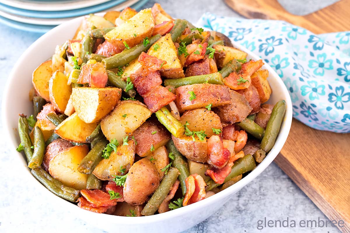 Green Beans and Potatoes in a white bowl.