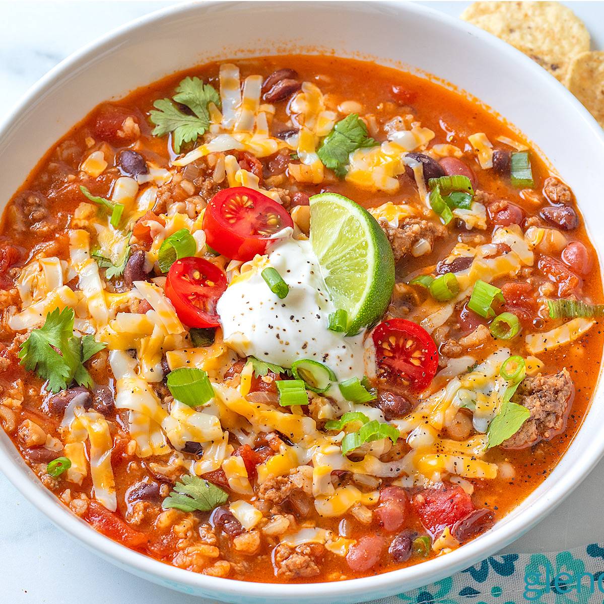 Taco Soup in a white ceramic bowl.