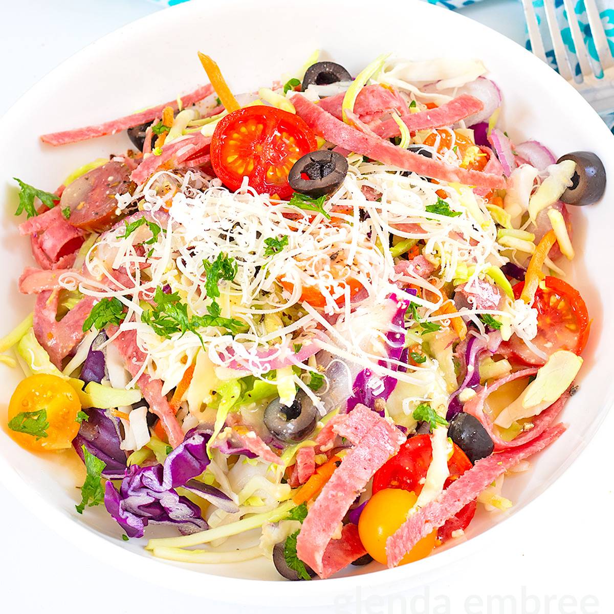 Italian Cabbage Salad with Salami in a white bowl.