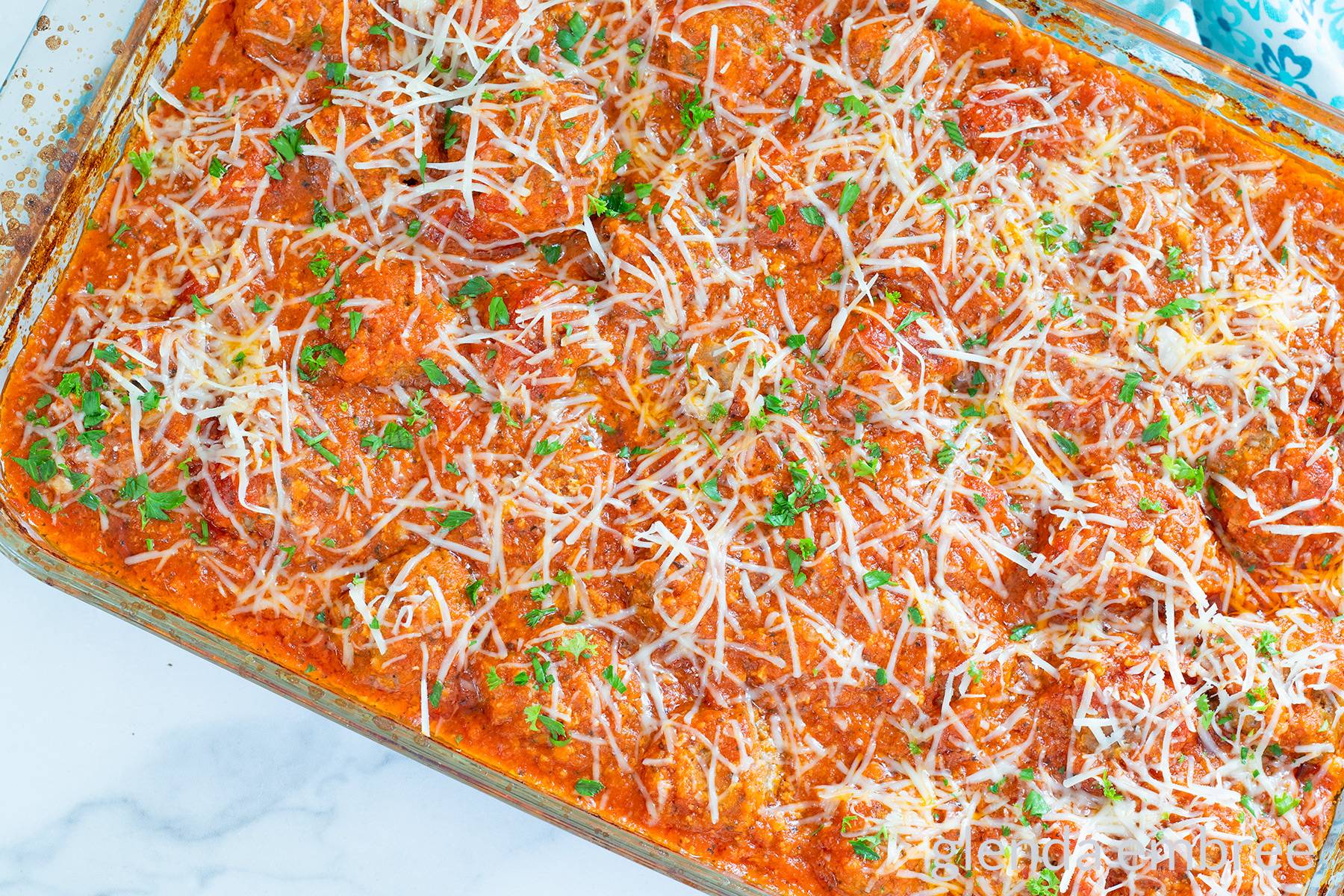 Porcupine Meatballs in a glass baking dish.