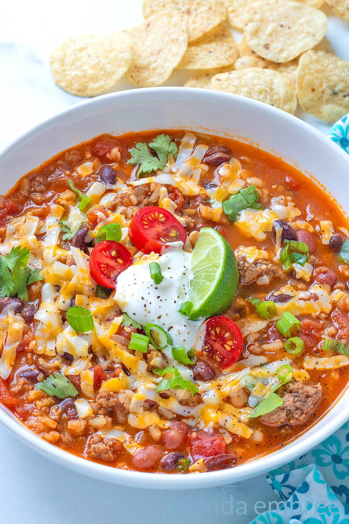 Taco Soup in a white ceramic bowl.