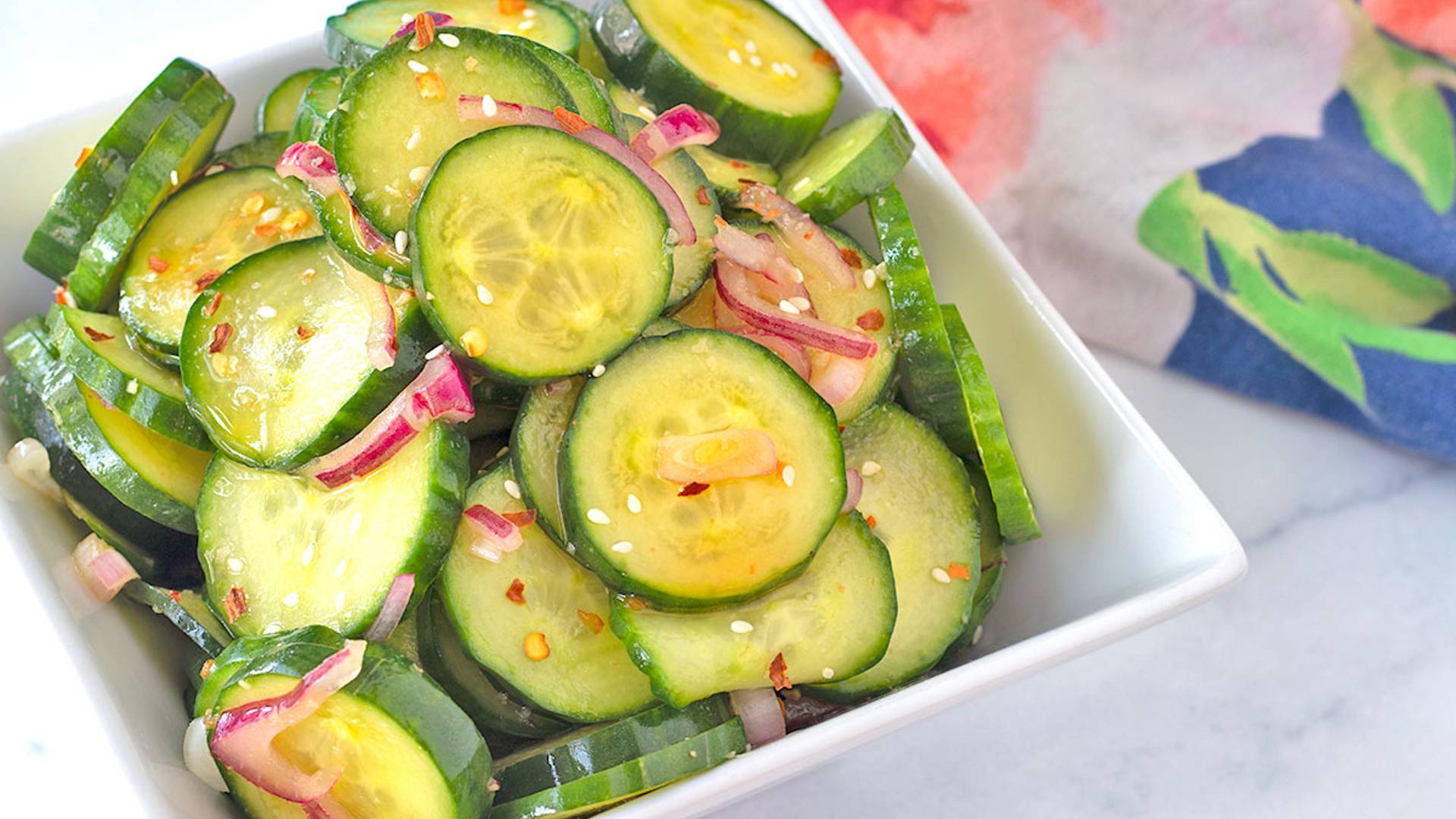 Asian Cucumber Salad in a square white serving dish.