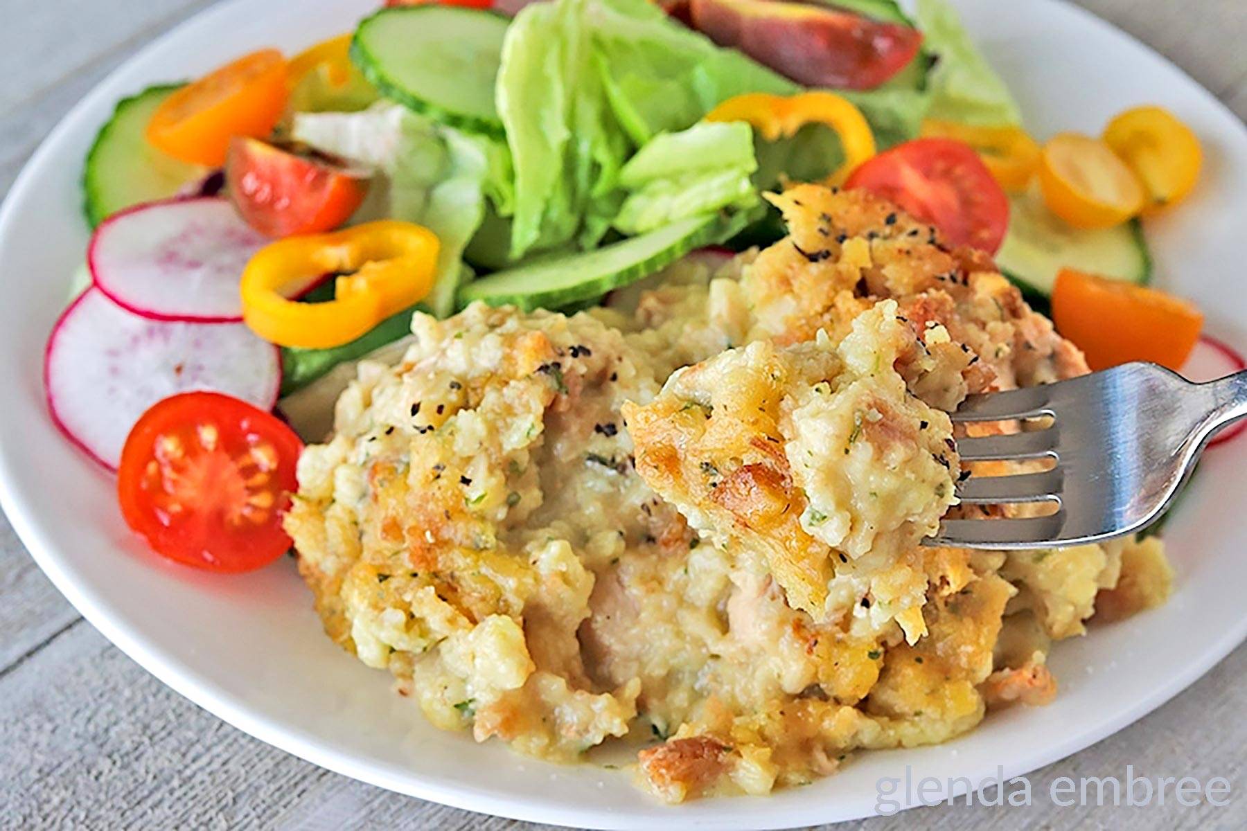 Thanksgiving Casserole on a white plate with House Salad.