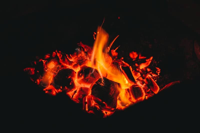 A close up of a fire in the dark