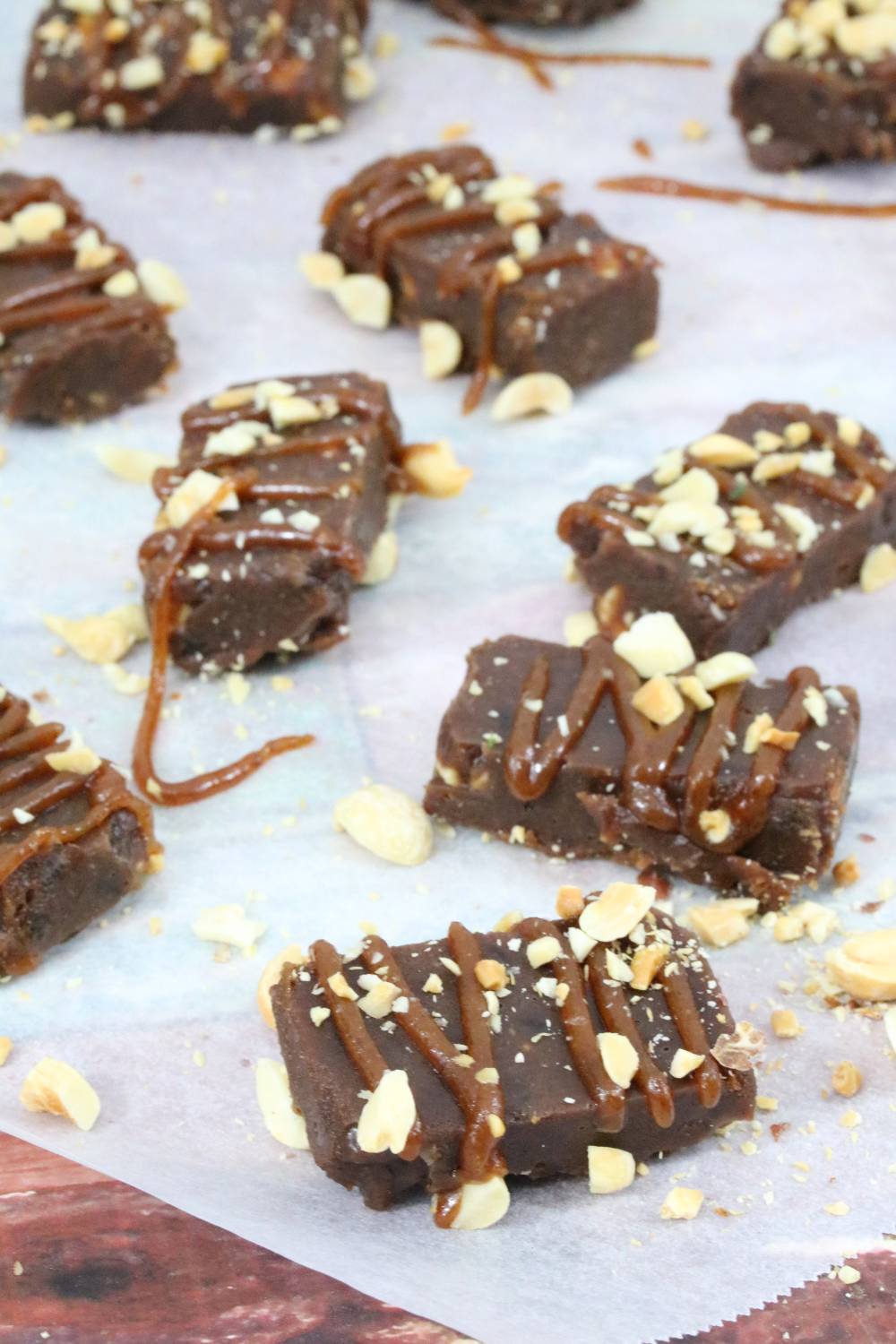 Healthy snickers on parchment paper.