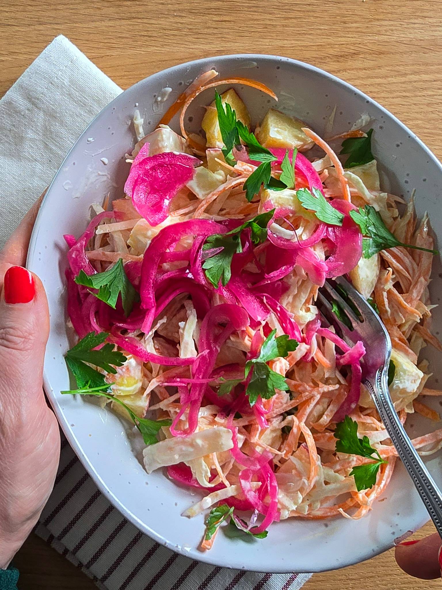 A winter celeriac slaw with carrots and pickled red onion.