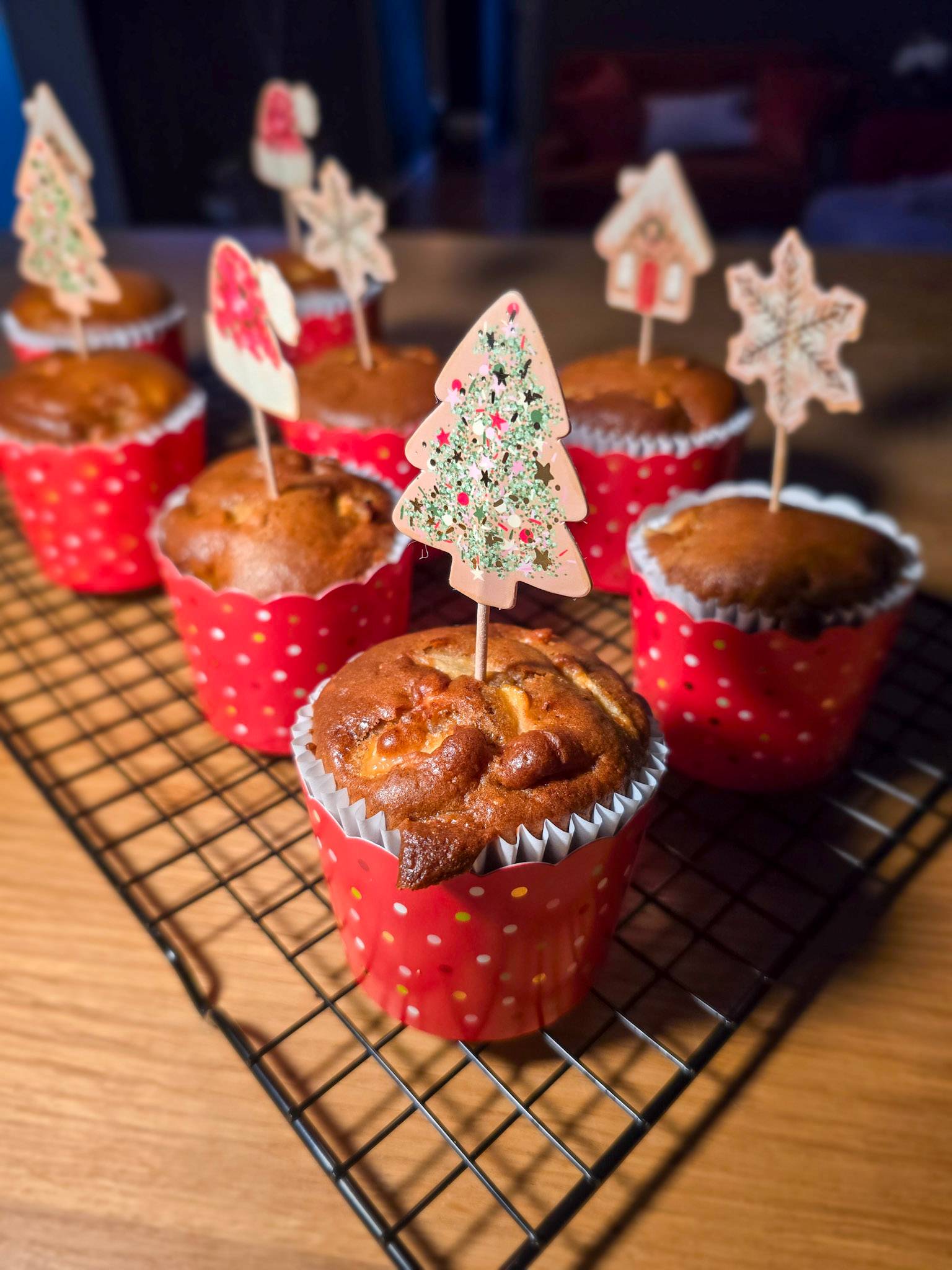 Festive muffins with red cases and a Christmas themed topping.