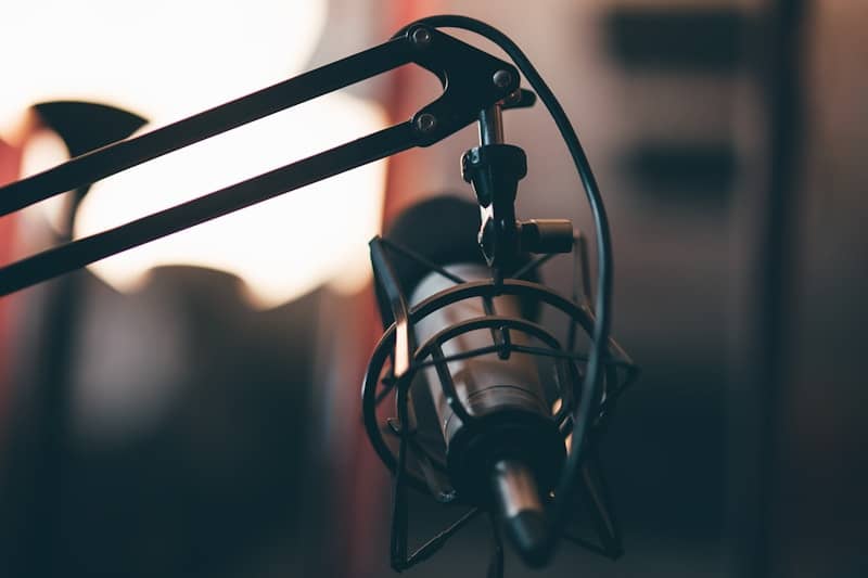 A close up of a microphone with a blurry background