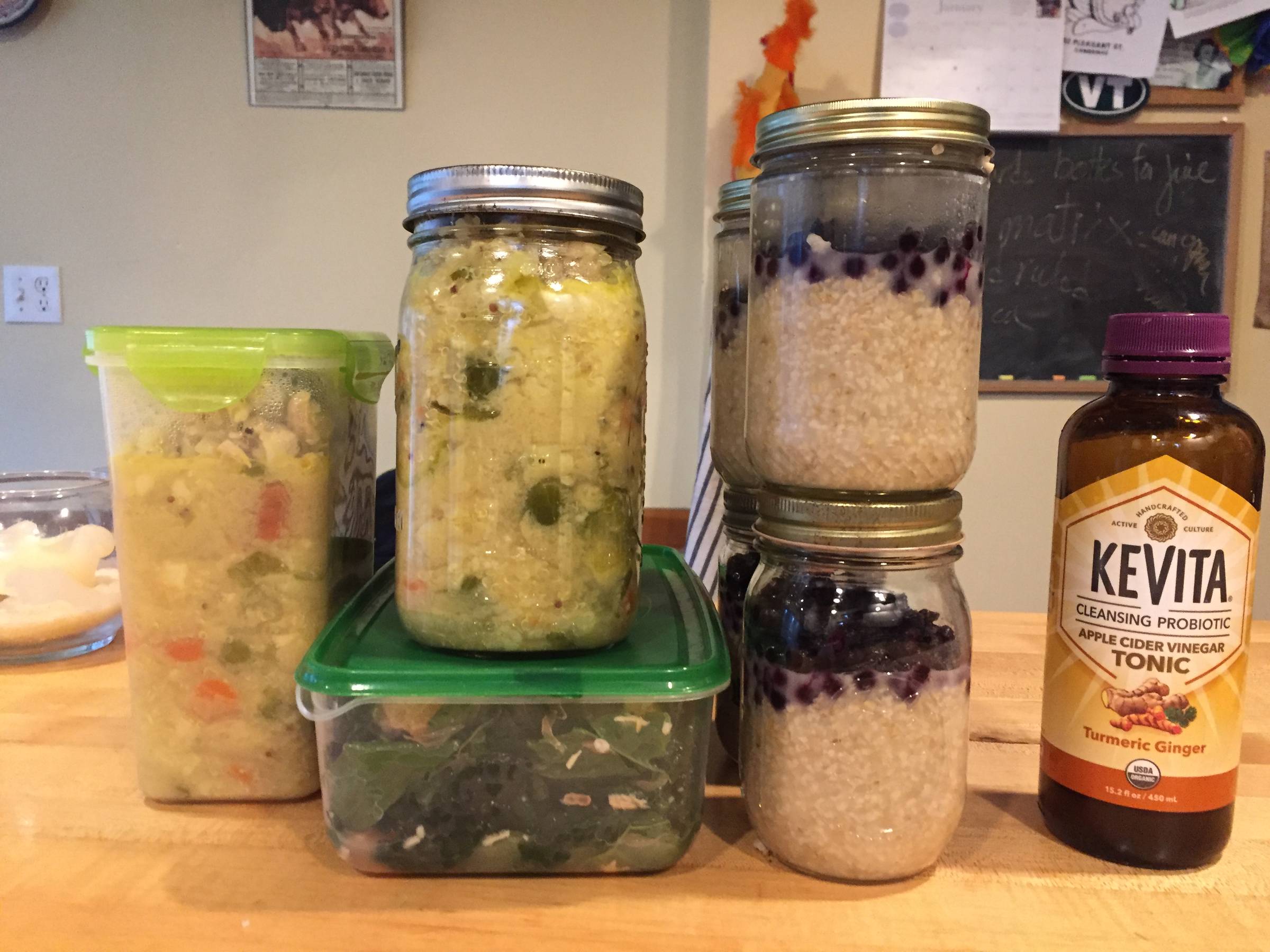 Photo of full meal prep containers and mason jars.
