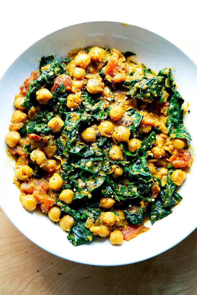 Spicy chickpeas with tomatoes and kale. 