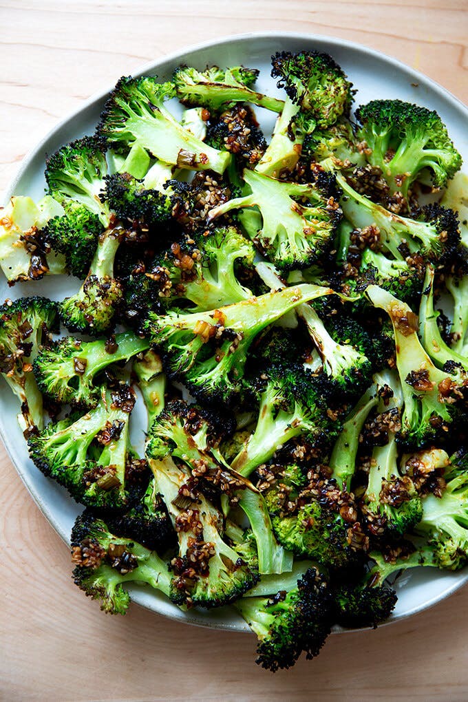 Broiled broccoli with sesame-scallion sizzle. 