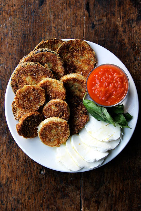 Crispy rounds of eggplant parmesan. 