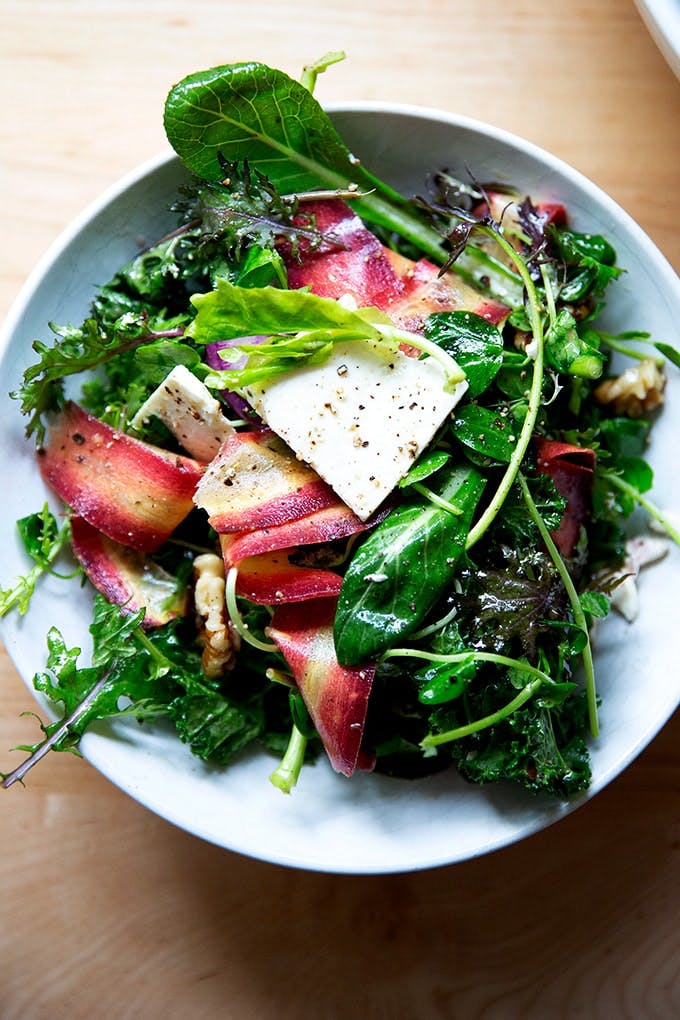 Lemon vinaigrette-dressed salad. 