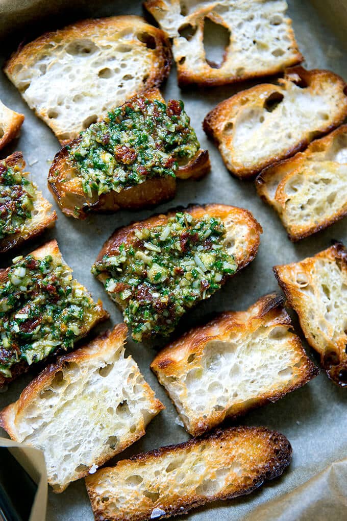 Sun-Dried Tomato Pesto on Crostini. 